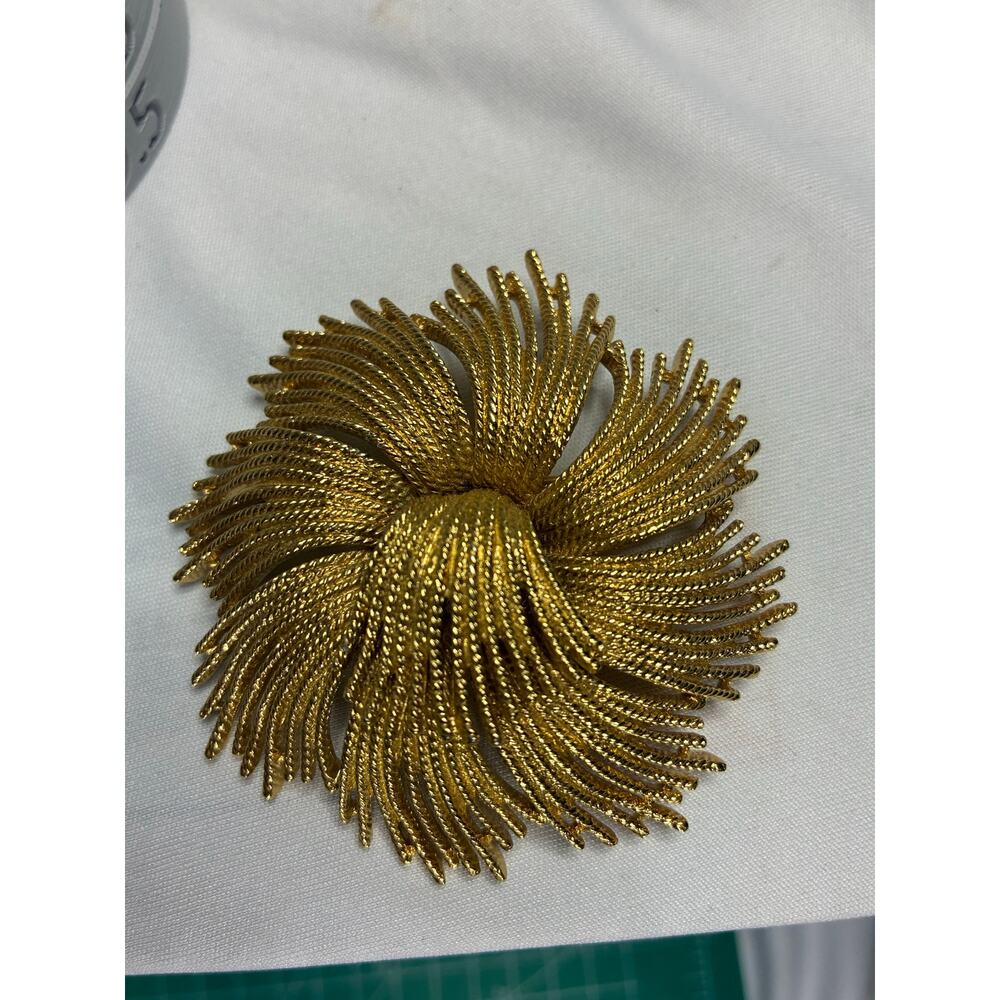 Monet "Cordelia" Gold Tone Brooch Pin - Signed 1960s Book Piece Starburst